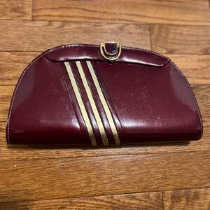Chic Maroon Clutch with Gold Stripes
